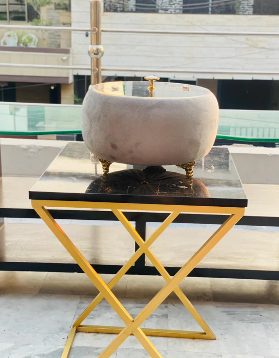 Grey Turkish Hotpot on a table in  patio